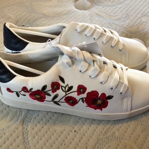 white sneakers with flowers
